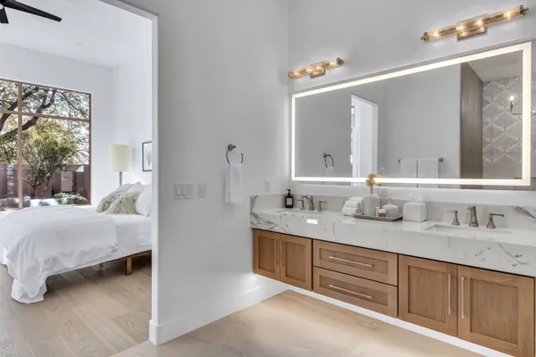 This real estate photography showcases a modern bathroom with natural light, located on E Caribbean Ln, Scottsdale, AZ.