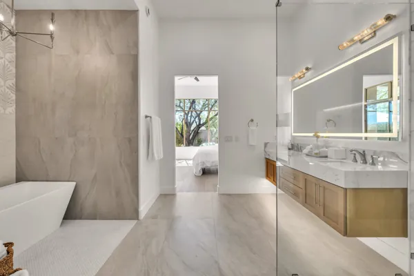 This luxurious Scottsdale, AZ bathroom showcases modern design with elegant marble countertops and a spacious layout, perfect for high-end real estate photography.