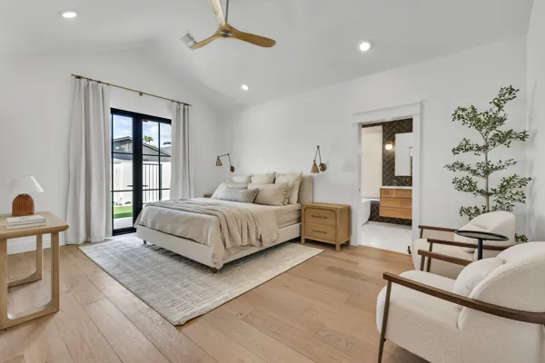 Explore luxury real estate photography showcasing a modern bedroom with elegant decor in Phoenix, AZ, capturing the essence of sophisticated living.