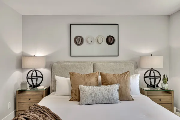 This stunning bedroom in Scottsdale, AZ features elegant decor and inviting ambiance, showcasing the finest in real estate photography.