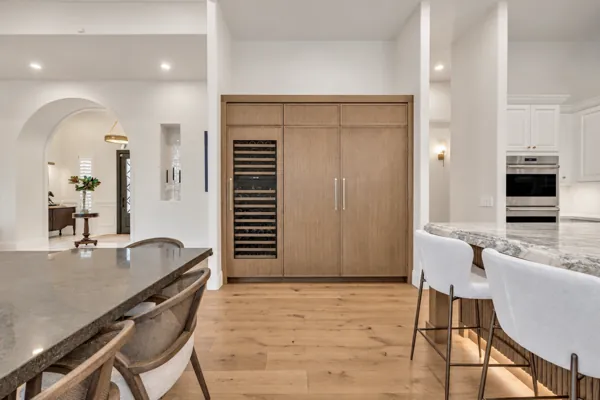 Explore luxury real estate photography showcasing a sophisticated kitchen with marble counters in Gilbert, AZ, highlighting modern design.