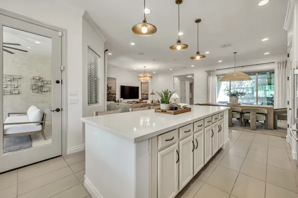 Explore this beautifully designed modern kitchen and dining area located in Mesa, AZ, showcasing the best in real estate photography.