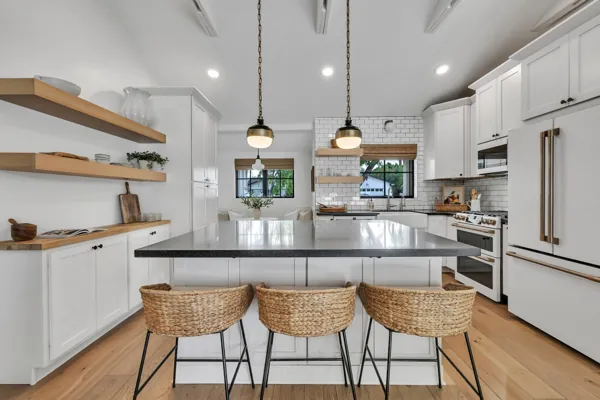Discover luxury real estate photography showcasing a stunning modern kitchen on E Avalon Dr, Phoenix, AZ, featuring sleek design and elegant details.