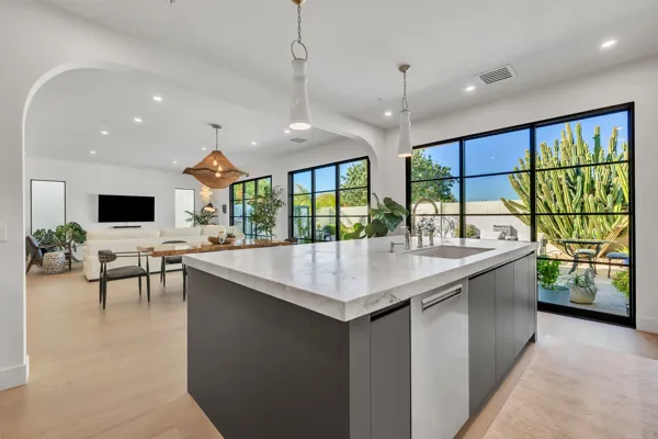 Experience luxury real estate photography with this stunning kitchen view in Scottsdale, AZ, featuring a modern design and abundant natural light.