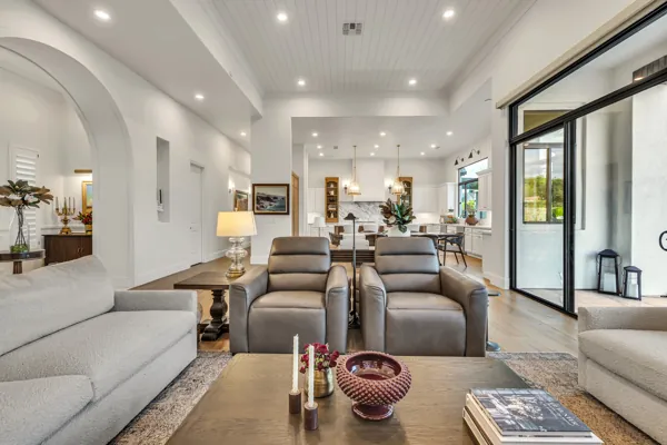 Experience luxury real estate photography in this stunning open-concept living room located in Gilbert, AZ.
