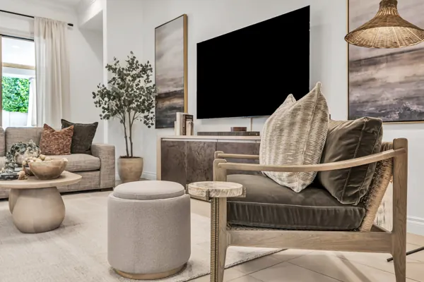Experience sophisticated real estate photography capturing a modern living room in Mesa, AZ, highlighting stylish decor and comfortable furnishings.