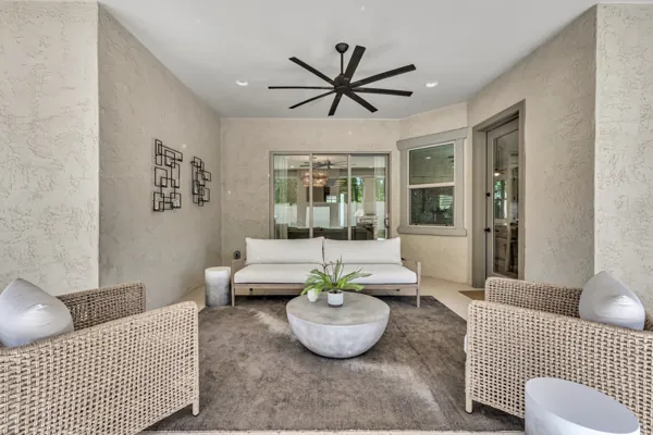 Explore this modern patio with woven chairs in Mesa, AZ, captured through stunning real estate photography showcasing elegant outdoor living spaces.