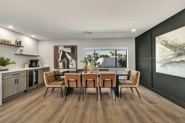 This real estate photography captures a stylish dining area with contemporary decor in Scottsdale, AZ, showcasing the elegance of modern living.
