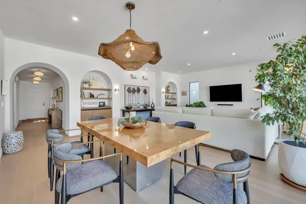 Discover luxury real estate photography showcasing a modern dining area with elegant decor in a stunning home located in Scottsdale, AZ.