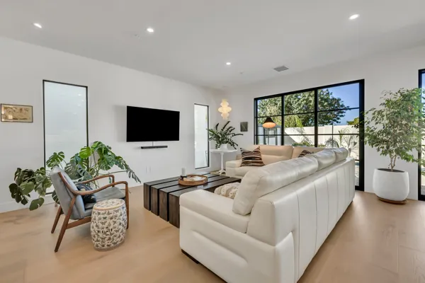 Experience luxury real estate photography showcasing a stylish living room in a Scottsdale, AZ home, featuring elegant design and abundant natural light.