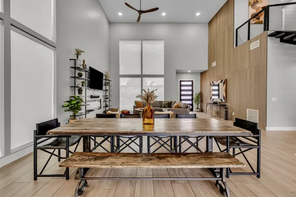 Spacious modern living area in Scottsdale, AZ, ideal for an Airbnb photo shoot with its sleek design and rustic elements.