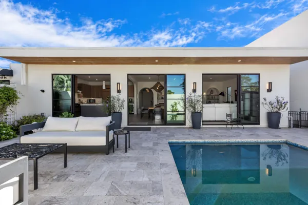 This luxury real estate photography showcases a stunning modern patio and pool area in Scottsdale, AZ.